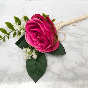 May include: A distressed wooden sign, reading "Welcome to our home" in white lettering. The sign has a rustic finish, ideal for adding a welcoming touch to any home's entrance.
