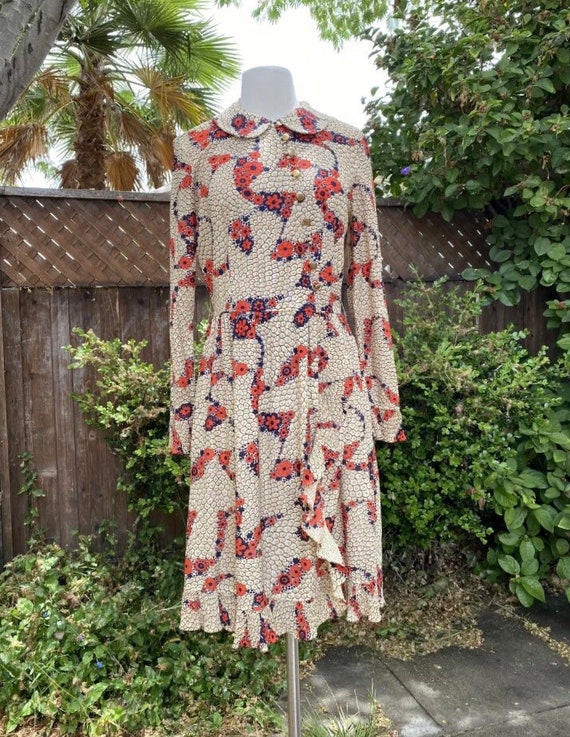 Spectacular 1970s rayon jersey dress.