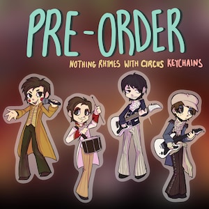May include: A set of four illustrated character keychains featuring band members in circus-themed attire. The text reads PRE-ORDER NOTHING RHYMES WITH CIRCUS KEYCHAINS. The characters include a singer, drummer, and two guitarists in colourful outfits.