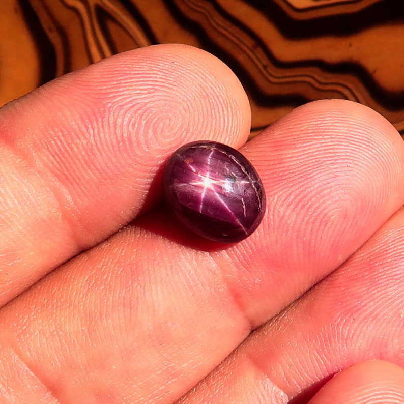Oval Red 6 Rays Star Ruby Cabochon 6.0 CT 11.2 mm x 9.3 mm x 5.1 mm