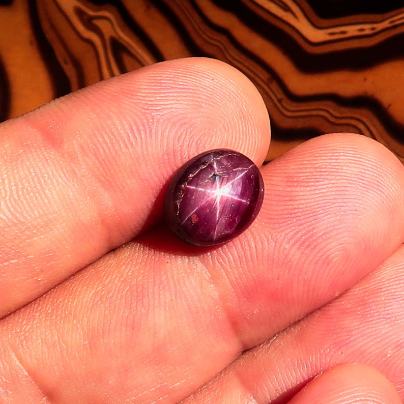 Oval Red 6 Rays Star Ruby Cabochon 6.0 CT 11.2 mm x 9.3 mm x 5.1 mm