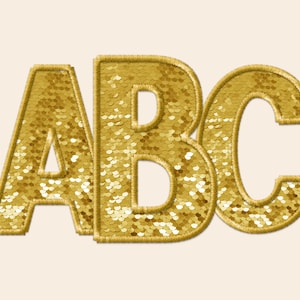 May include: Gold sequined letters spelling out "ABC".