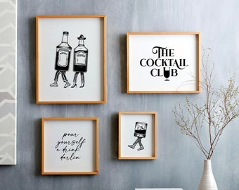 May include: Four framed prints with a cocktail theme. The top left print shows two cartoon bottles of liquor walking. The top right print says "The Cocktail Club". The bottom left print says "pour yourself a drink darlin". The bottom right print shows a cartoon glass of liquor walking.