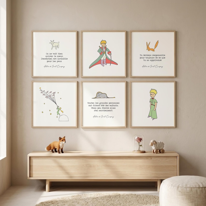 May include: Six framed art prints with illustrations and quotes from "The Little Prince." The prints feature drawings of a goat, the Little Prince, a fox, a person with a parachute, an elephant, and the Little Prince in a green outfit.