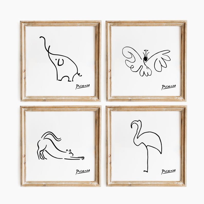 May include: Four framed art prints with minimalist line drawings of an elephant, butterfly, cat, and flamingo. Each black and white artwork is signed "Picasso" and set in a light brown wooden frame.