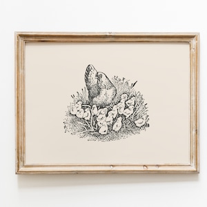 May include: A black and white illustration of a hen with a group of chicks in a grassy area. The hen is standing tall with its wings spread out, and the chicks are huddled around it.
