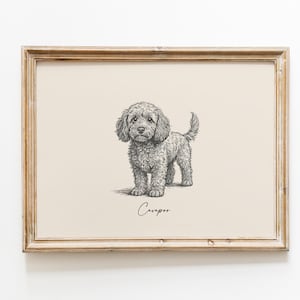 Könnte beinhalten: Gerahmte Federzeichnung eines Cavapoo-Hundes. Das Kunstwerk zeigt eine detaillierte Skizze des Hundes in stehender Pose, mit dem Namen "Cavapoo" in Kursivschrift darunter. Der Rahmen ist hellbraun.