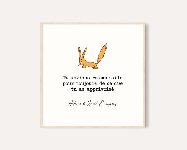 Puede incluir: Una impresi&oacute;n enmarcada con una ilustraci&oacute;n de un zorro de dibujos animados en naranja y negro. La impresi&oacute;n incluye la cita francesa "Tu deviens responsable pour toujours de ce que tu as apprivois&eacute;" y el nombre del autor, Antoine de Saint-Exupery.