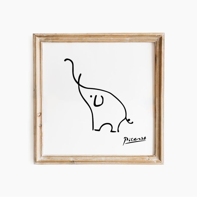 May include: A framed art print with a minimalist black line drawing of an elephant on a white background. The artwork is signed "Picasso" in the lower right corner. The frame is a light brown colour.