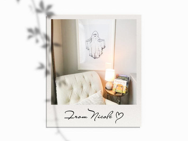 May include: A white armchair with a white and gray striped upholstery sits in a room with a framed black and white drawing of a ghost on the wall. A small table with a lamp and a stack of children's books sits next to the chair. The text "From Nicole" is written on the bottom of the image.