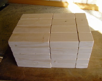 60 XXL wooden building blocks made from local untreated spruce wood in 3 lengths