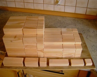 150 pieces of large wooden building blocks made from local wood in 6 dimensions