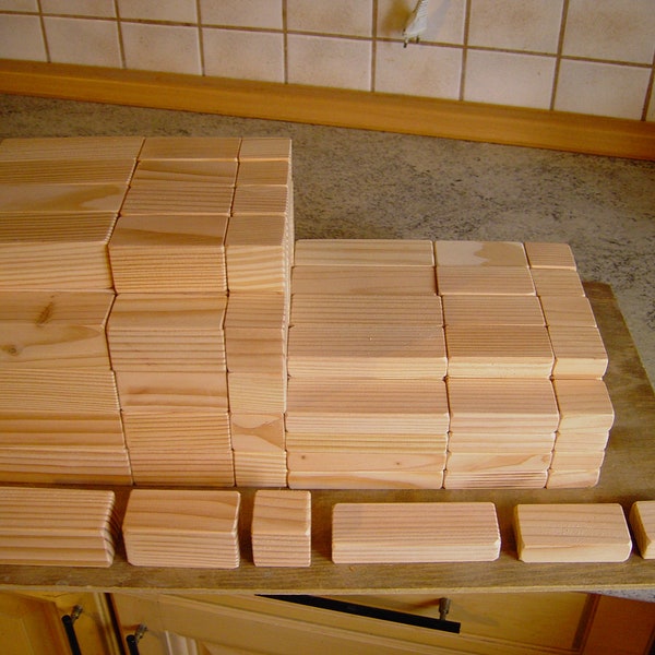 150 pieces of large wooden building blocks made from local wood in 6 dimensions