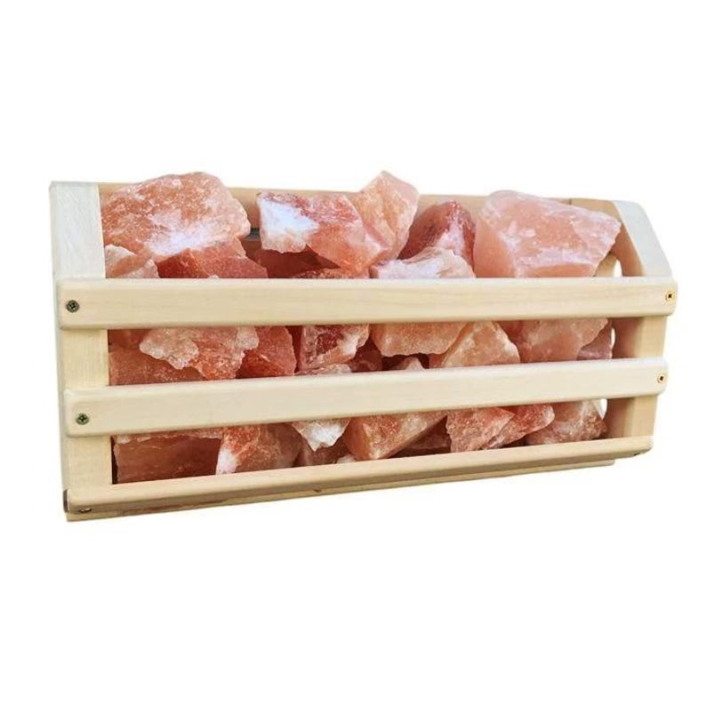 May include: A wooden box filled with pink Himalayan salt rocks. The box has a slatted design and is ideal for use in a sauna or steam room.