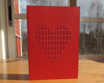 Tastbare aanraking met een motief, personaliseerbaar met uw eigen boodschap in braille