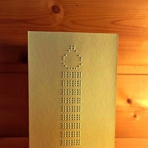 Carte en braille avec message personnalisé et image en relief d'une élégante bougie