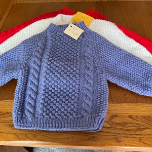 Hand knitted Aran jumpers and cardigans for kids