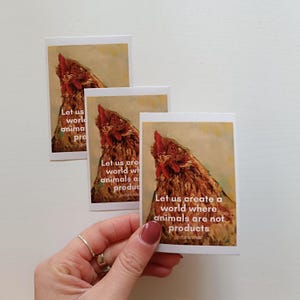 Poule. Sticker végétalien avec don