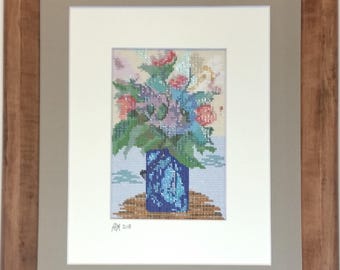 Tapiz de cuentas enmarcado con flores de Ida
