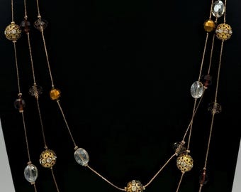 Vintage three strand gold tone necklace