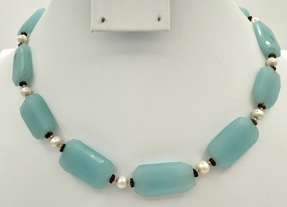 Light turquoise faceted glass beads