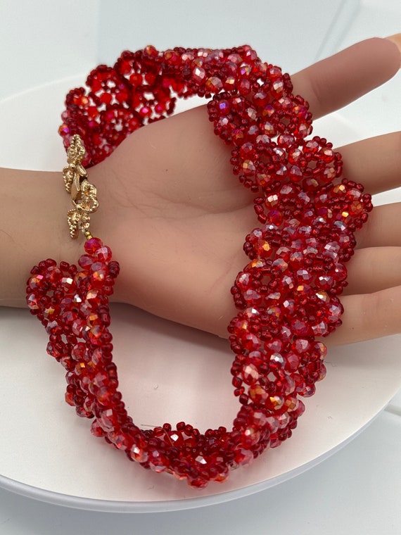 Red beaded necklace gold tone fold over closure. - image 4