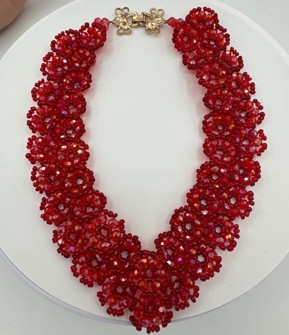 Red beaded necklace gold tone fold over closure. - image 3