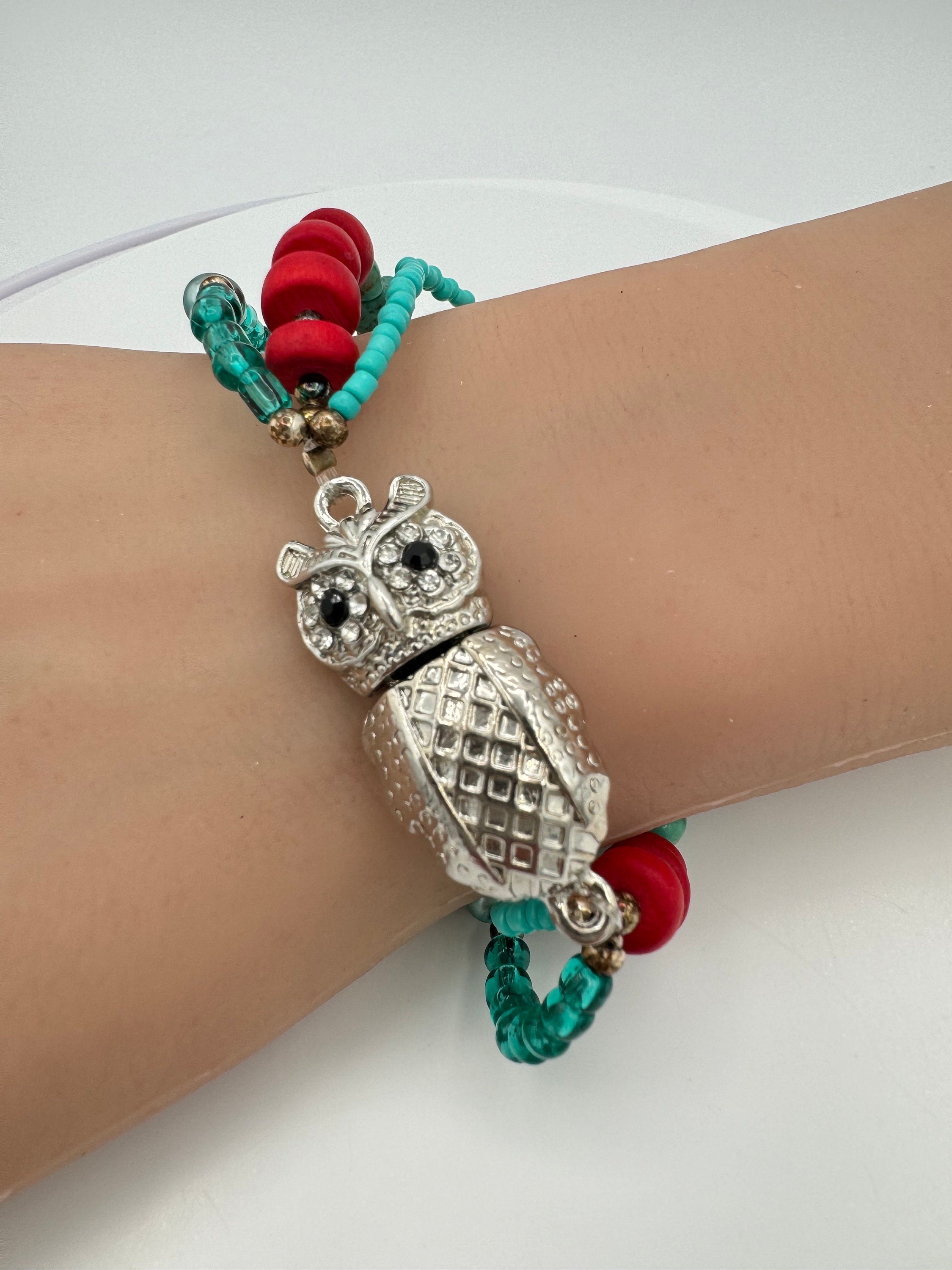 Turquoise beaded owl magnet closure bracelet.