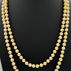 Gold tone, faux pearl necklace