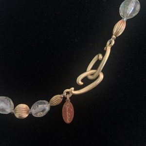 Oscar de la Renta, 42 in long beaded necklace.   Pastel and gold tone colors.