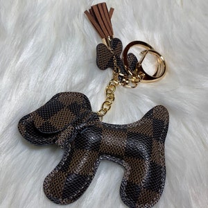 louis vuitton dog keychain, Luxury, Accessories on Carousell