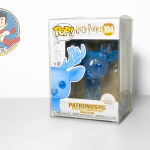 May include: A clear blue Funko Pop! vinyl figure of a stag Patronus from the Harry Potter series. The figure is in a box with the words "Patronus Harry Potter" and "Wizarding World" on it.