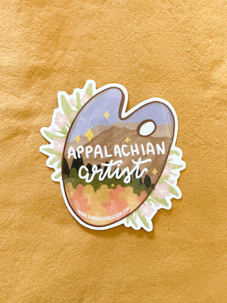 May include: A sticker featuring a paint palette with a mountain scene, stars, and the text "Appalachian artist" with a website address at the bottom.
