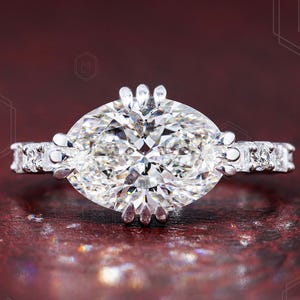 Ost West Oval Verlobungsring Triple Claw Prong Horizontal IGI Zertifizierter Labor Diamant Solitär Ehering Pave Setting Versprechensring