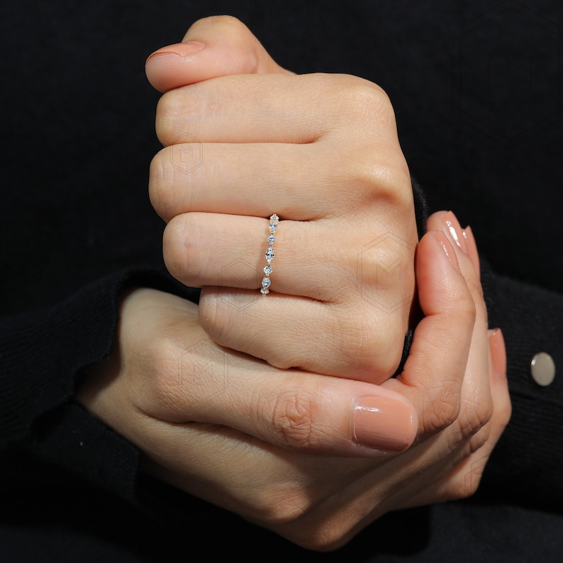 2mm stackable wedding band crafted with lab grown marquise and round cut diamonds in a timeless design
