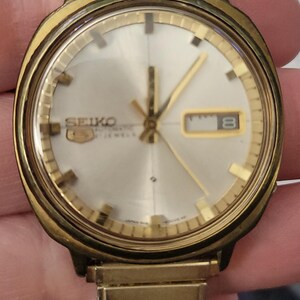 Vintage Mens Seiko 21 jewels 6119-6000 gold Speidel usa band M10