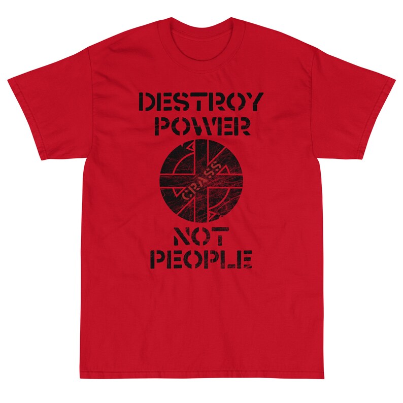 May include: Red t-shirt with a black graphic that says "DESTROY POWER" and features a circle with a symbol inside and the word "CRASS" written inside the circle. The graphic also says "NOT PEOPLE" underneath the circle.
