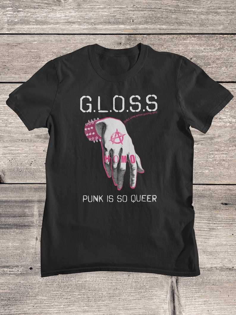 May include: Black t-shirt with the text "GLOSS" in white, a pink hand with an anarchy symbol and the text "HOMO" on the fingers, and the text "PUNK IS SO QUEER" in white.