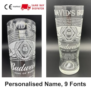 May include: A clear glass Budweiser pint glass with a personalised name, "DAVID'S", etched on the front. The glass features the Budweiser logo and the text "King of Beers".