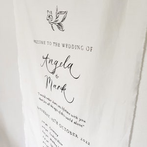 May include: A wedding announcement with a simple floral design. The text reads "Welcome to the wedding of Angela & Mark" and includes the date "Saturday, 15th October 2022" and a list of wedding events.