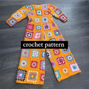 May include: A crochet jumpsuit with a patchwork design featuring squares of various colours, including yellow, orange, red, green, blue, and purple. The jumpsuit has a loose fit and a wide leg.