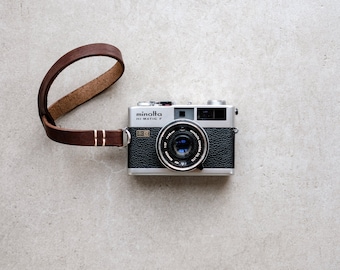 Handmade leather camera wrist strap in black and brown