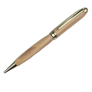 Stylo à bille fabriqué à la main en bois d'olivier italien. Parfait pour la retraite, un mariage, l'obtention du diplôme, un garçon d'honneur, la fête des pères