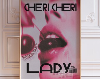 May include: A vintage poster with a pink and red colour scheme featuring a woman's lips with a cherry in them. The text on the poster reads "Cheri Cheri Lady 1985".