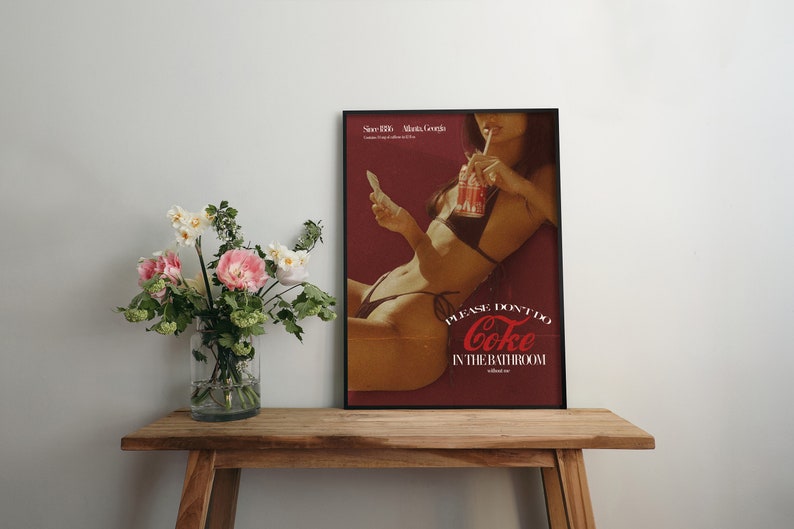 May include: A vintage-style poster featuring a woman in a bikini drinking a Coca-Cola. The poster has a red background with white text that reads "Please don't do Coke in the bathroom".