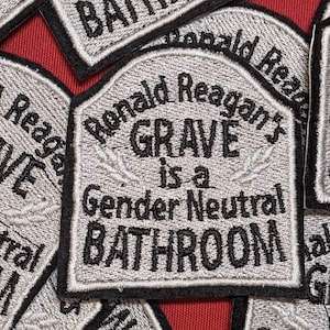 Ronald Reagan&#39;s Grave is a Gender neutral bathroom 65mm iron on patch