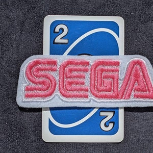 Inofficiell Sega Classic-logotyp 95 mm strykmärke (2) Amy Pink