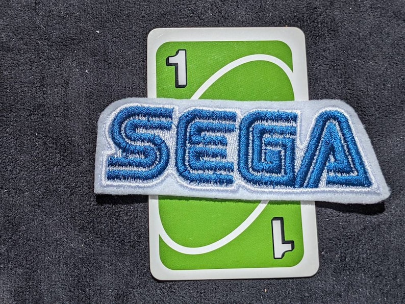 Inofficiell Sega Classic-logotyp 95 mm strykmärke (1) Sonic Blue