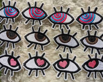 Rolling eyes set of two iron on patches 65mm