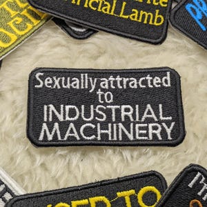 Sexually Attracted to Industrial Machinery 90mm iron on patch